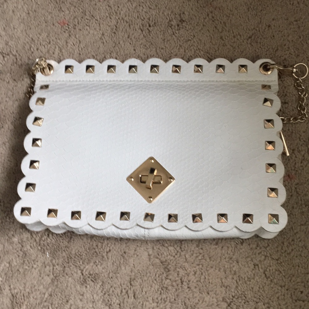 White leather snake skin print bag